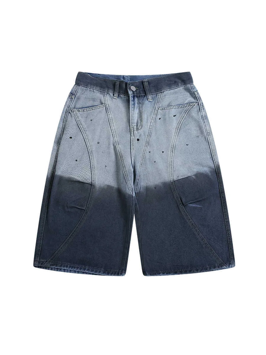 Blue tie-dye gradient cropped jeans with a loose fit and washed-out, worn-looking finish.