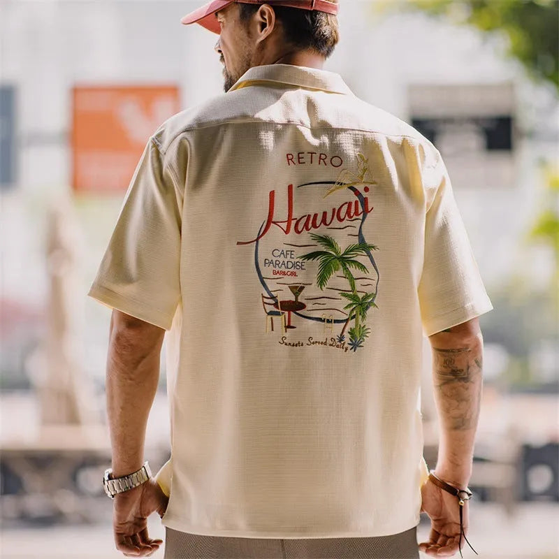 Light apricot men's Cuban collar shirt with bamboo plant and flower pattern