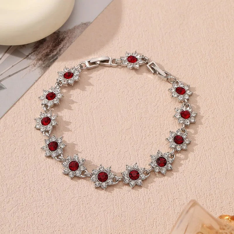 Flower charm bracelet in zinc alloy with electroplated finish and colourful crystal accents