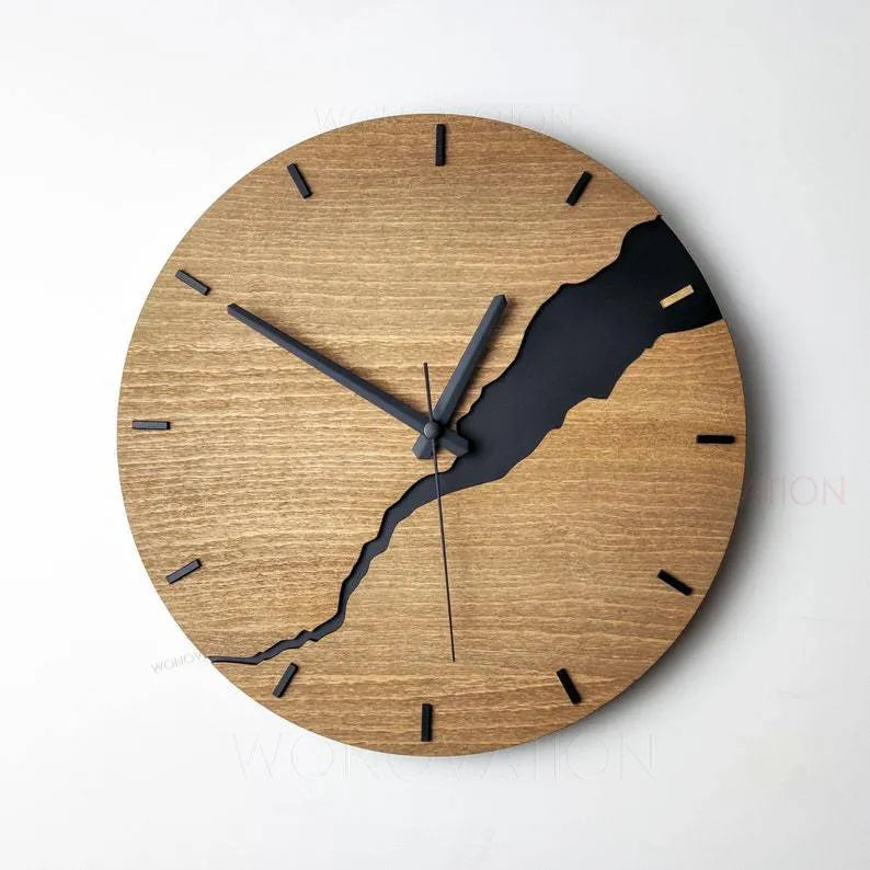 Modern wooden wall clock with creative crack design on a simple shell.