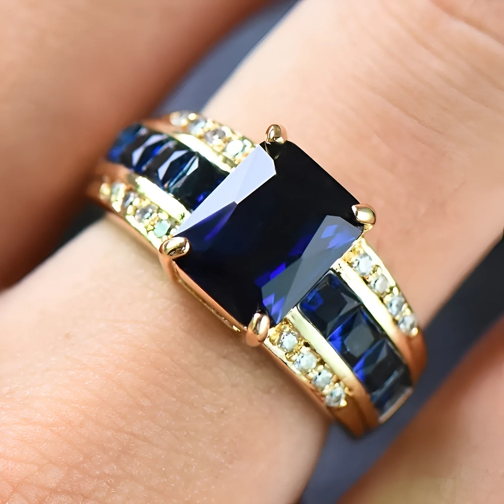 Zinc alloy ring with diamond treatment in blue and purple colour options showing unisex design