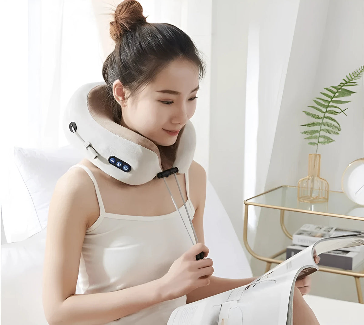 Brown U-shaped electric neck massager with fabric cover and control buttons