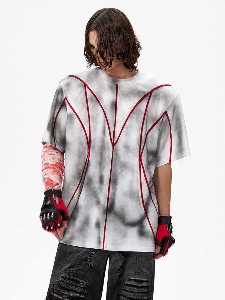 Men's T-shirt with padded shoulders and raised patchwork line detailing on front