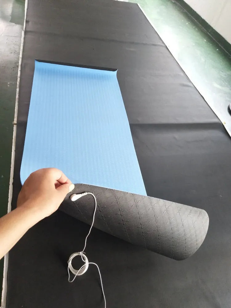 Blue conductive yoga mat with plants pattern, showing grounding wire and 182cm x 61cm x 5mm dimensions.