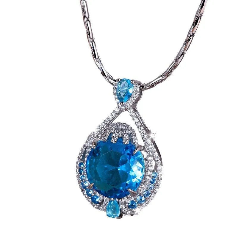 Blue geometric crystal pendant necklace with water wave chain, women's jewellery with fireworks-cut gems