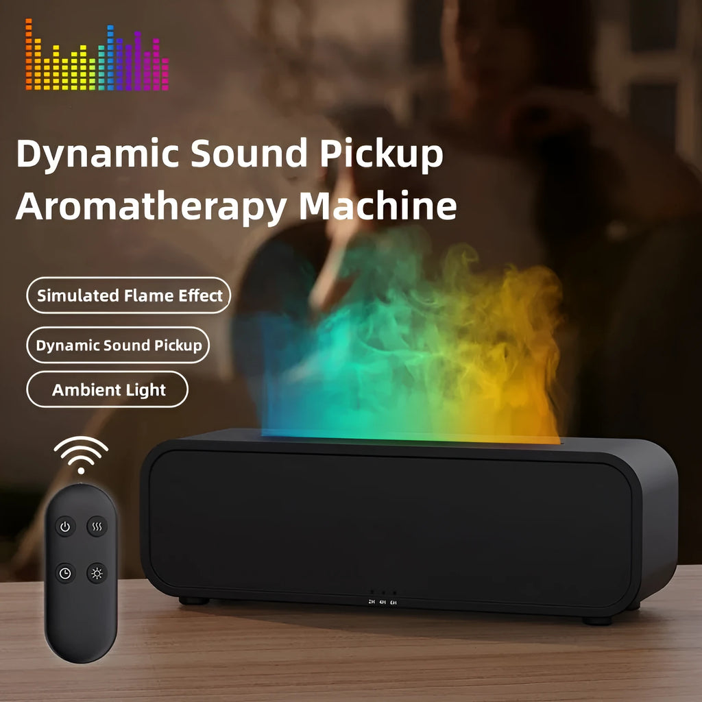 Black aroma diffuser with colour-changing flame light effect and remote control on a table.