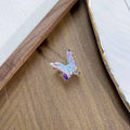 Adjustable copper insect motif ring with textured drip oil finish shown in available colour variations