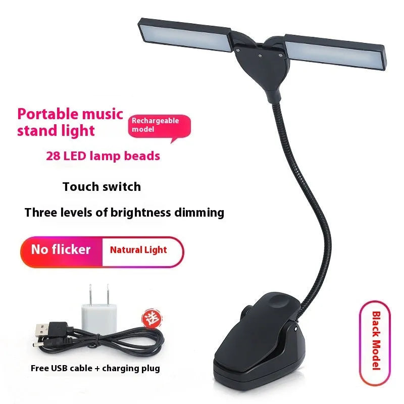 Black rechargeable LED music stand lamp with clip, shown illuminating sheet music.