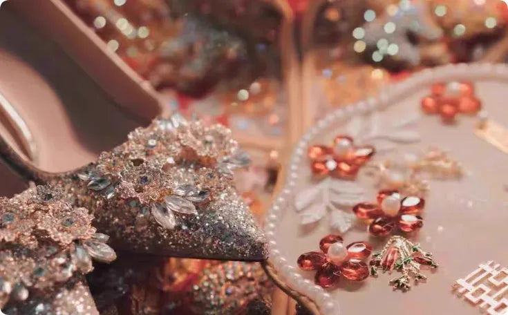 Champagne coloured women's wedding high heel shoes with crystal decoration and a pointed toe.