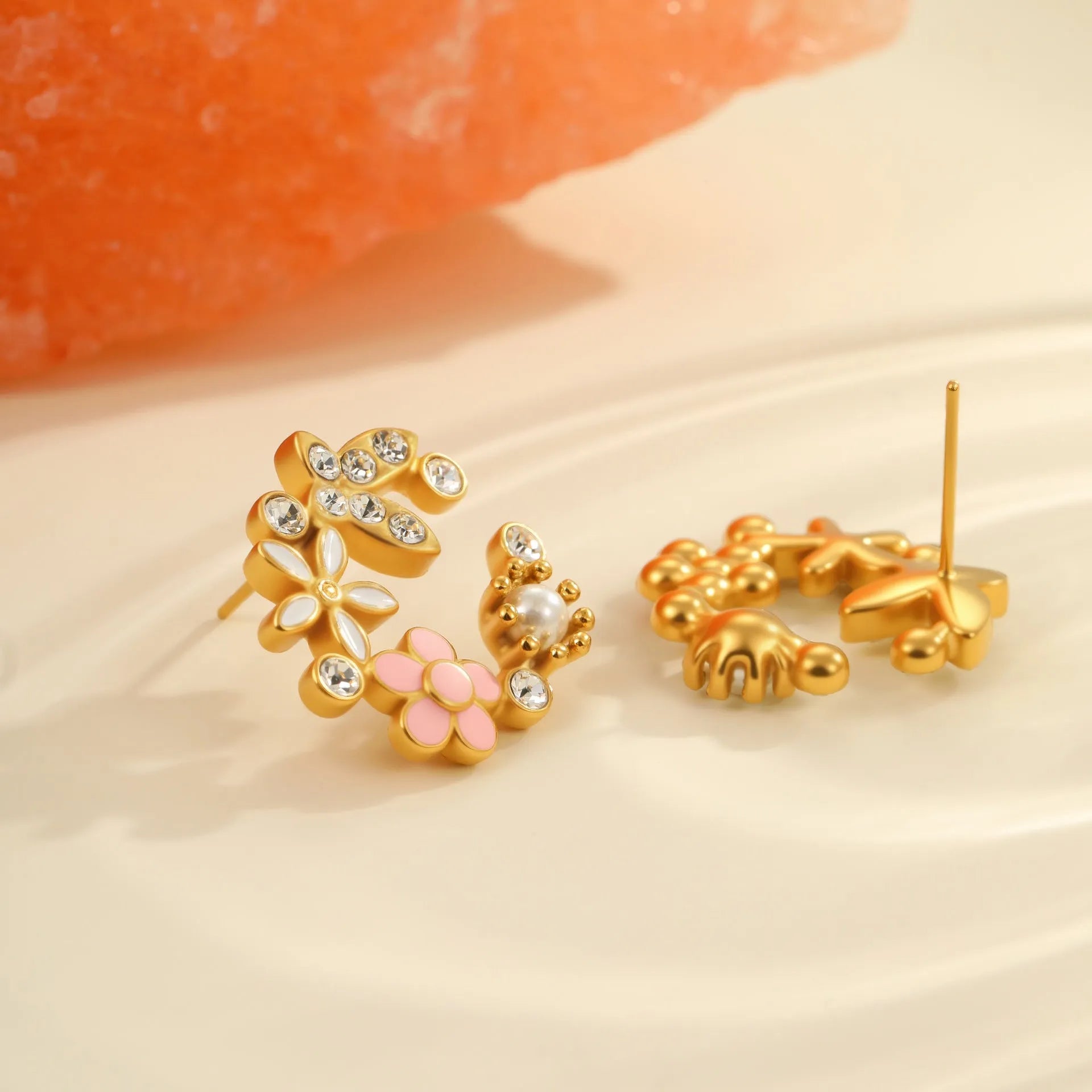 Flower stud earrings with petal design in 18K gold electroplated finish on stainless steel