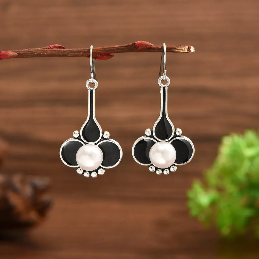 Women's retro fashion earrings with electroplated silver finish on alloy metal
