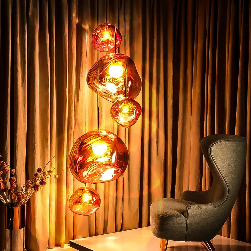 Nordic post-modern lava glass chandelier in gold finish with irregular pendant design