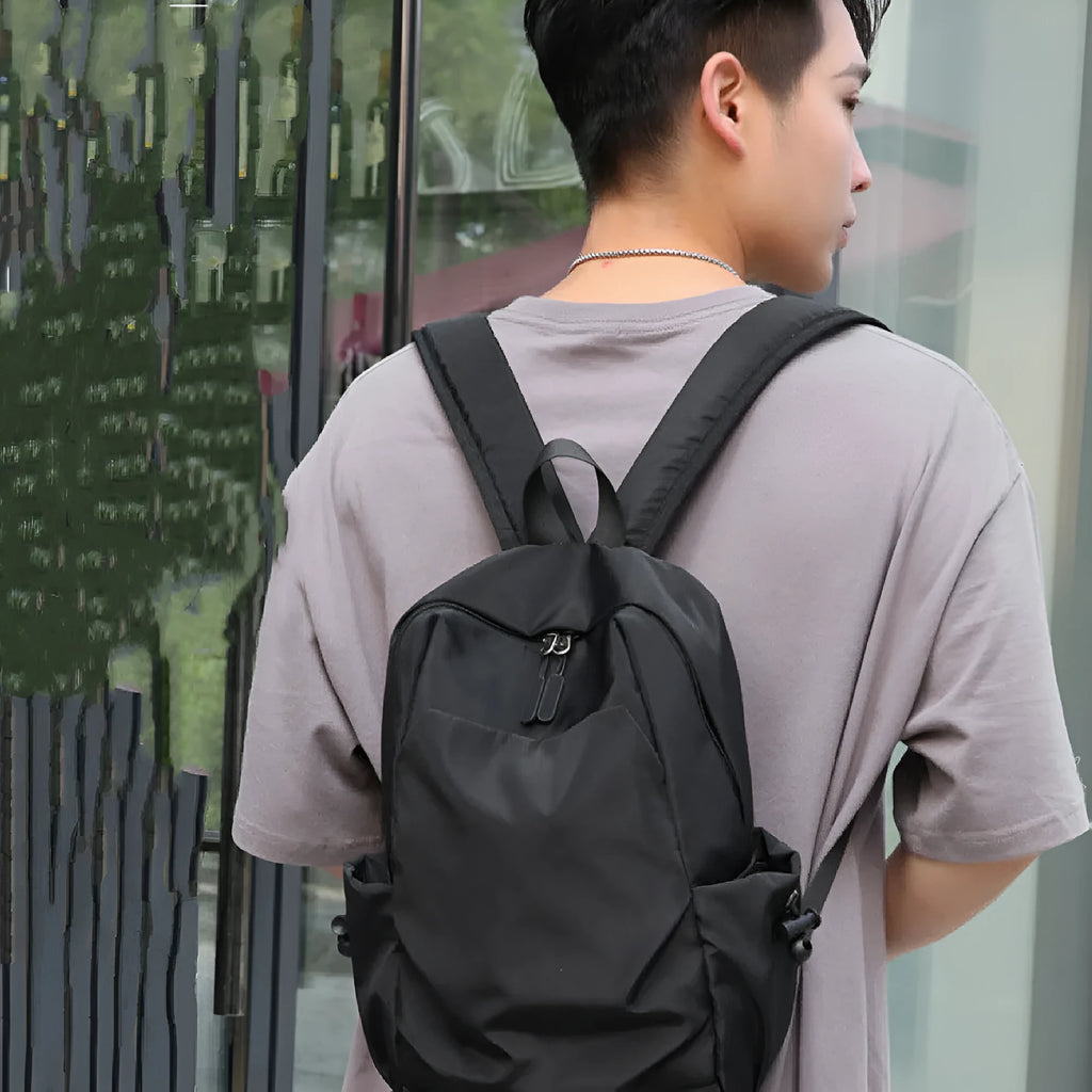 Oxford cloth backpack for men in black or gray with breathable design and polyester cotton lining