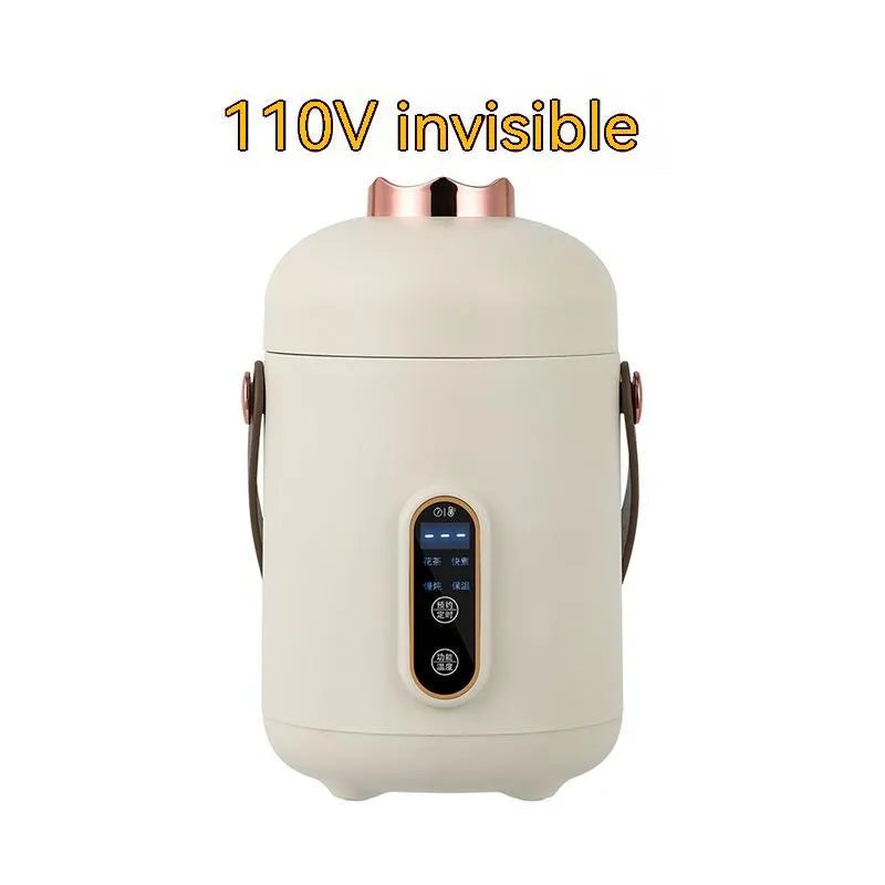 Compact white electric stew cooker with glass pot and digital display, shown with spoon.