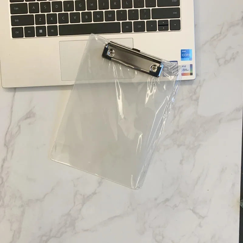 Transparent A4 plate writing board pad with a silver metal flat clip, shown in a blue colour option.