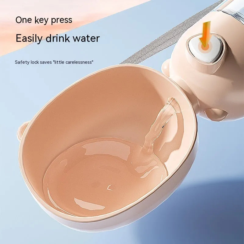 Portable dog water bottle and food container in brown, pink and yellow colours with included dog cup