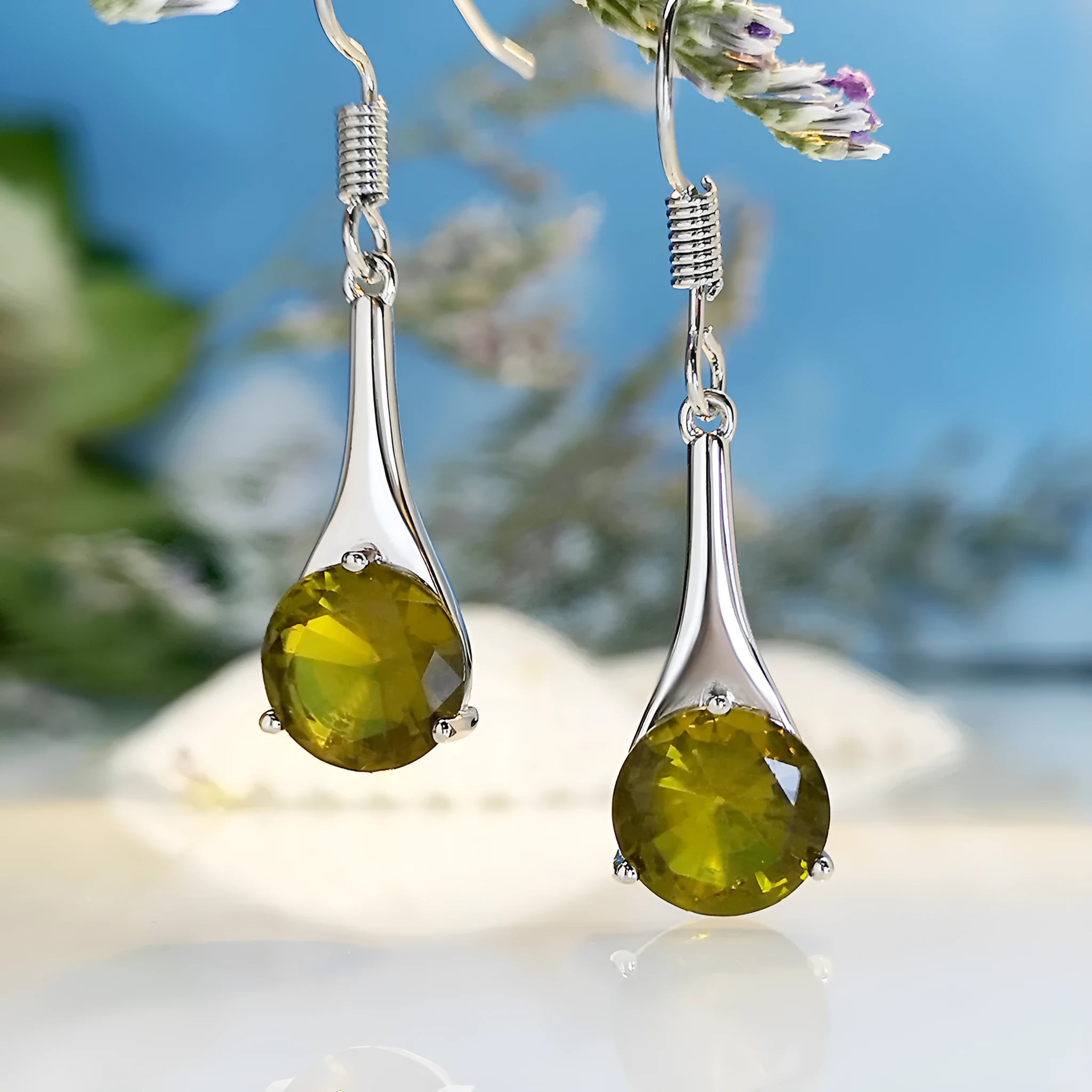 Olive green topaz water drop shaped earrings with electroplated finish and minimalist design
