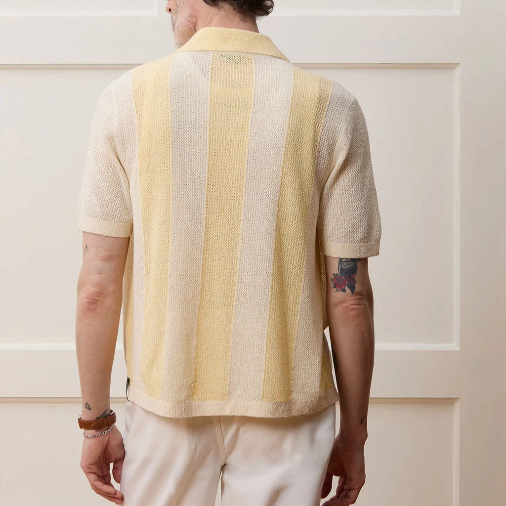 Yellow casual polo shirt with hollow-out design and asymmetric style in Tencel fabric