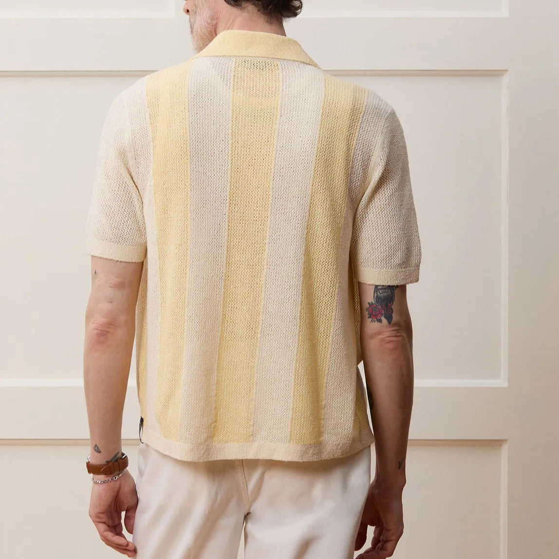 Yellow casual polo shirt with hollow-out design and asymmetric style in Tencel fabric