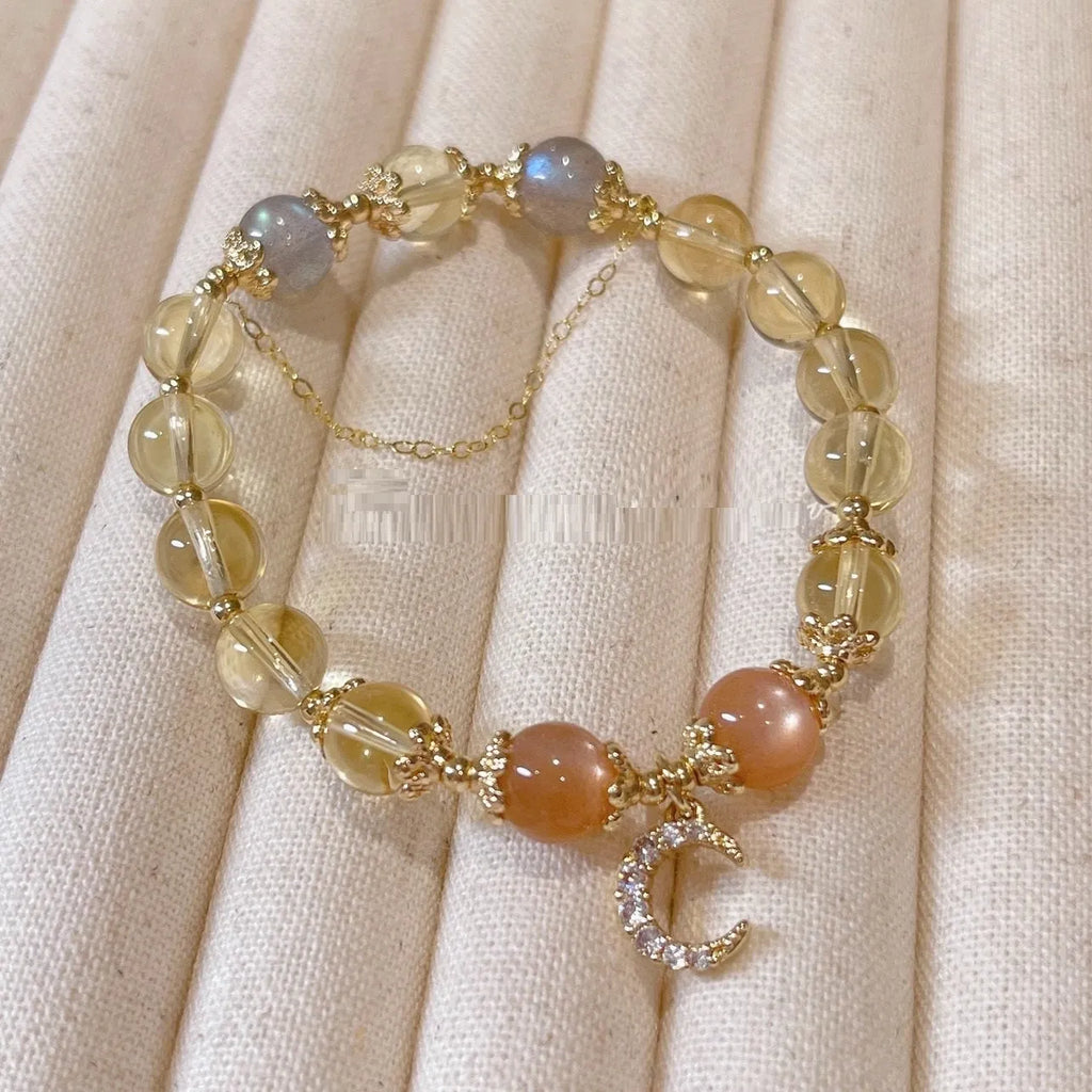 Chinese style women's crystal bracelet with electroplated 14K gilded finish and diamond-shaped moonstone golden sun stone elements
