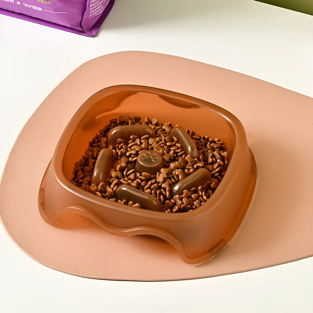 Plastic dog slow feeder bowl with maze pattern design in blue, grey, green or orange colours