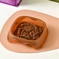 Plastic dog slow feeder bowl with maze pattern design in blue, grey, green or orange colours