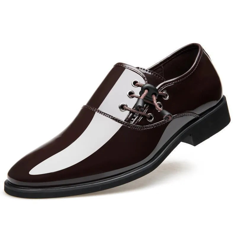 Men's black and brown formal oversleeve shoes with round toe and square heel on a rubber sole.