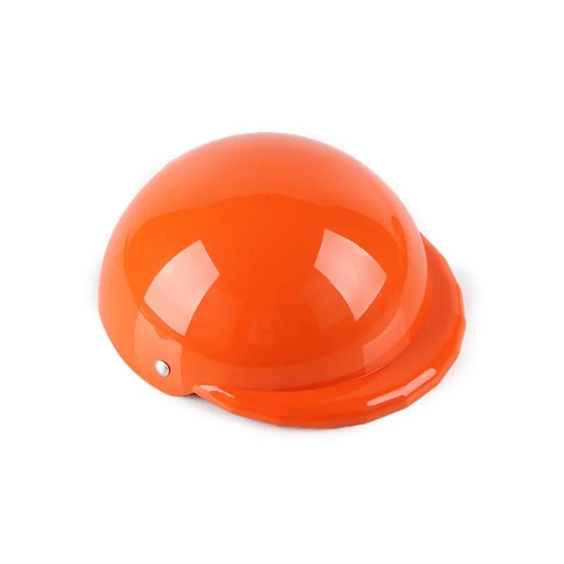Plastic dog motorcycle cap helmet in assorted colours on a white background