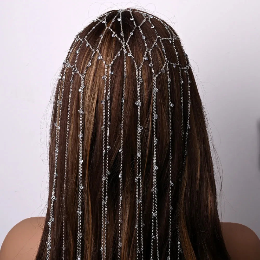 Gold electroplated mesh headband with clear rhinestones and dangling metallic tassels