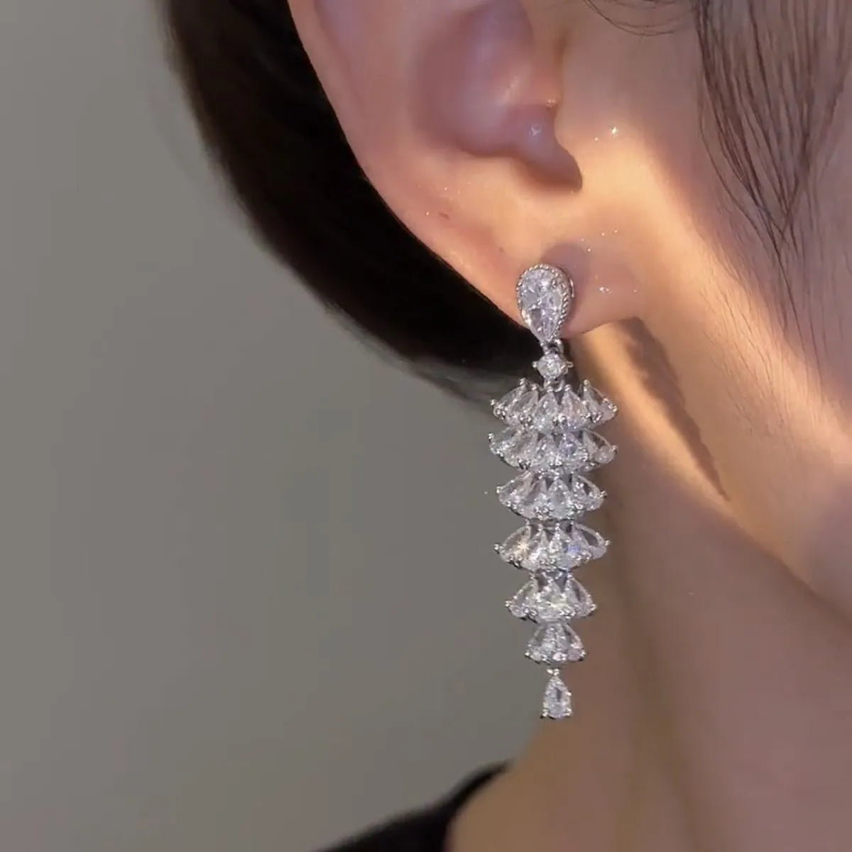Silver pagoda Christmas tree drop earrings with sparkling zircon detailing and stud fastening