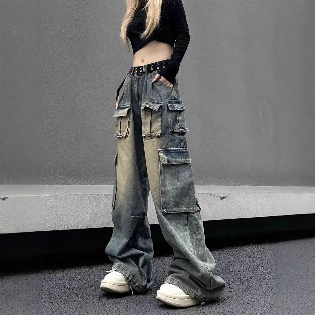 Light blue distressed denim pants with multiple pockets and straight leg loose fit