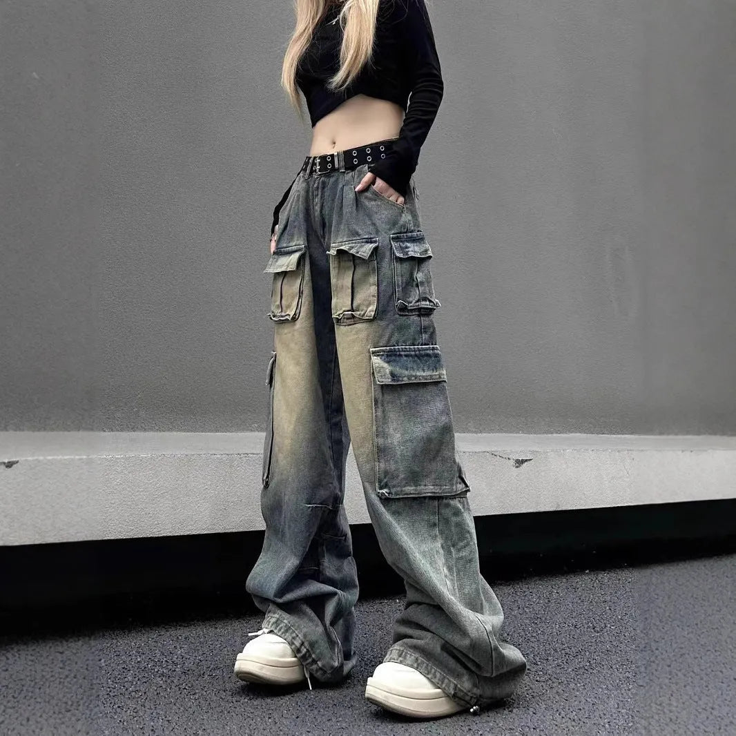 Light blue distressed denim pants with multiple pockets and straight leg loose fit