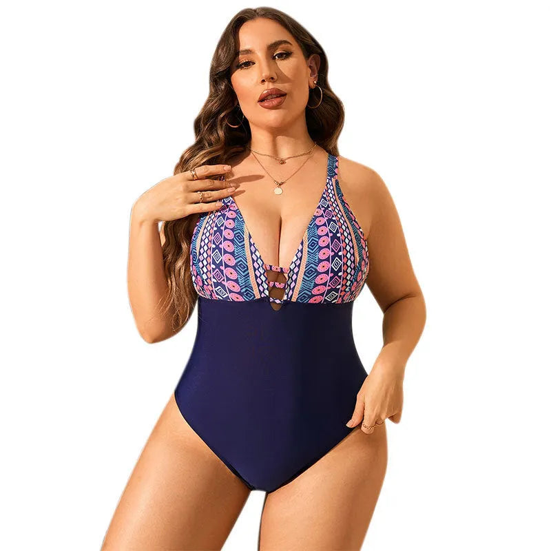 Leopard print plus size one-piece swimsuit with V-neck and conservative cut for belly coverage.