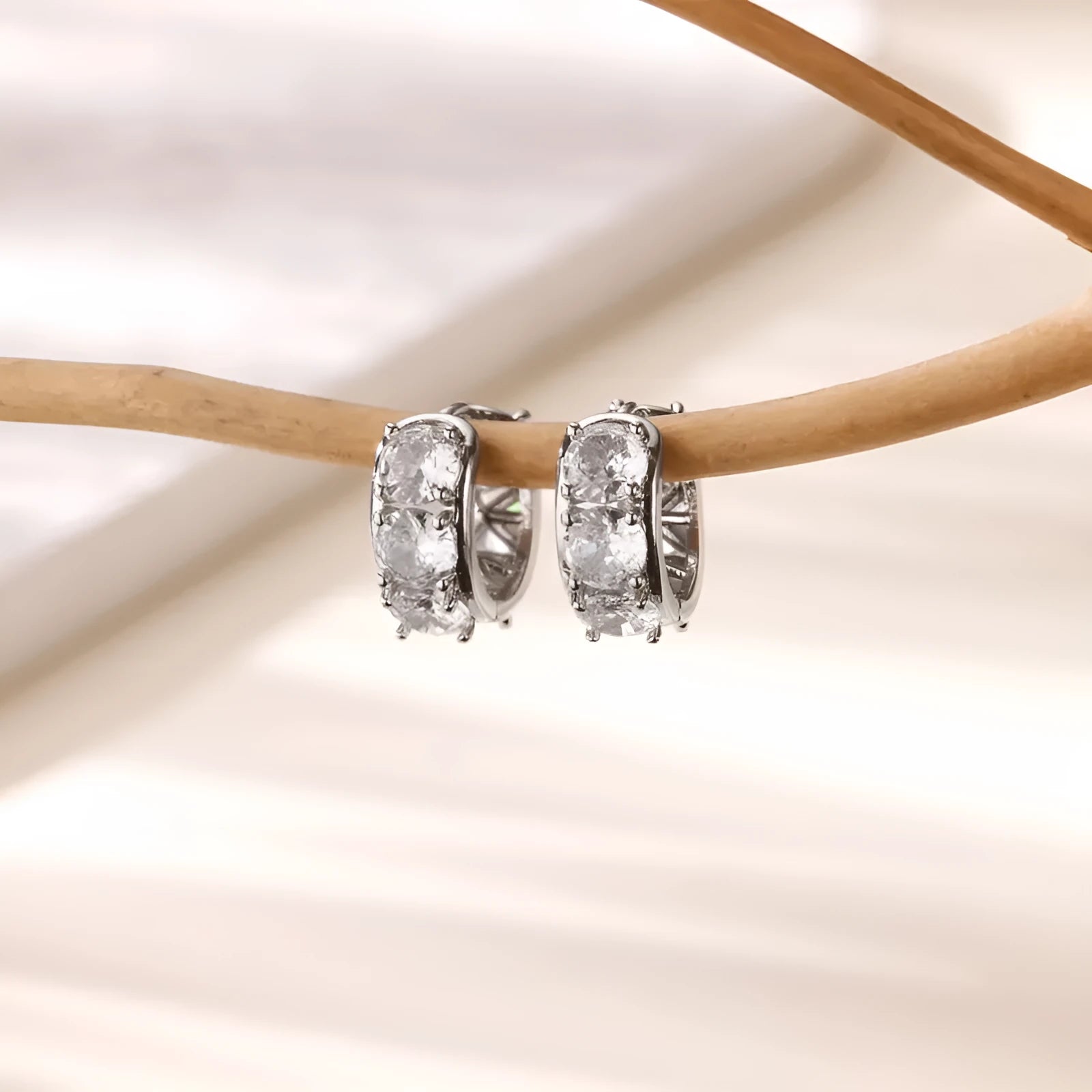 Pair of stainless steel U-shaped ear clip earrings with inlaid zircon stones in E5772P colour for women