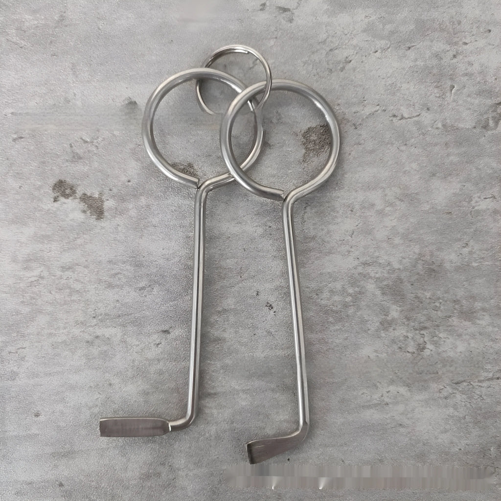 Two alloy wrench tools from a portable universal maintenance set.