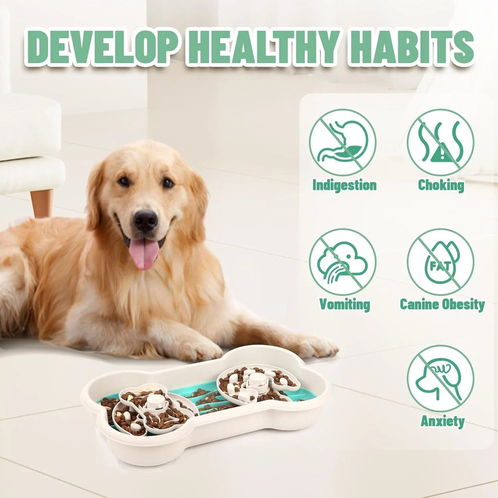 Large green slow feeder dog bowl with wave-pattern trays and suction cups on a wooden floor.