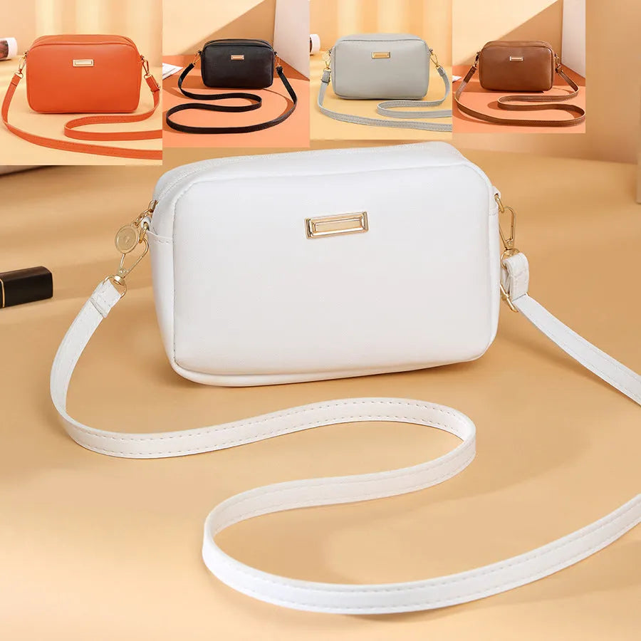 Solid-colour women's PU shoulder bag with three-dimensional pocket and horizontal square shape