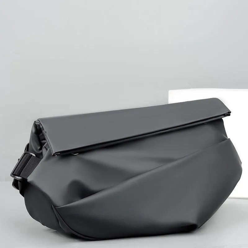Men's black PU leather crossbody sling backpack with shoulder strap and zipper opening