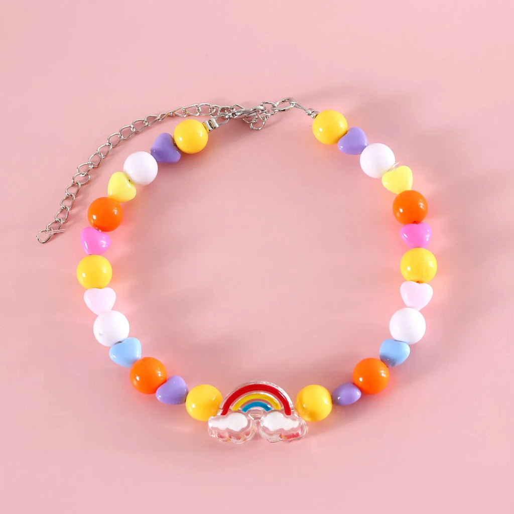 Colourful plastic pearl pet necklace for cats with adjustable sizing in rainbow, peach, and small flower patterns