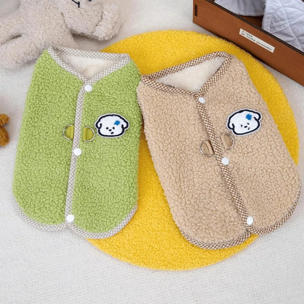 Green coral fleece dog vest with a metal leash ring on the back, sized for a small dog.