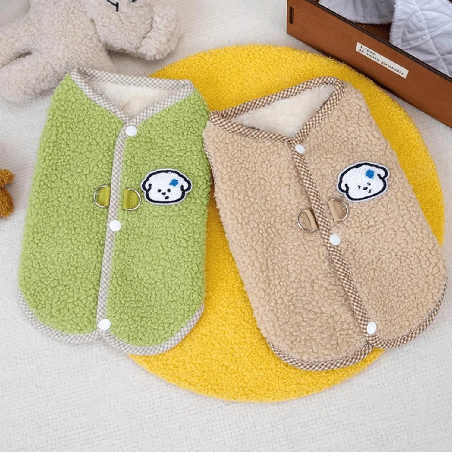 Green coral fleece dog vest with a metal leash ring on the back, sized for a small dog.