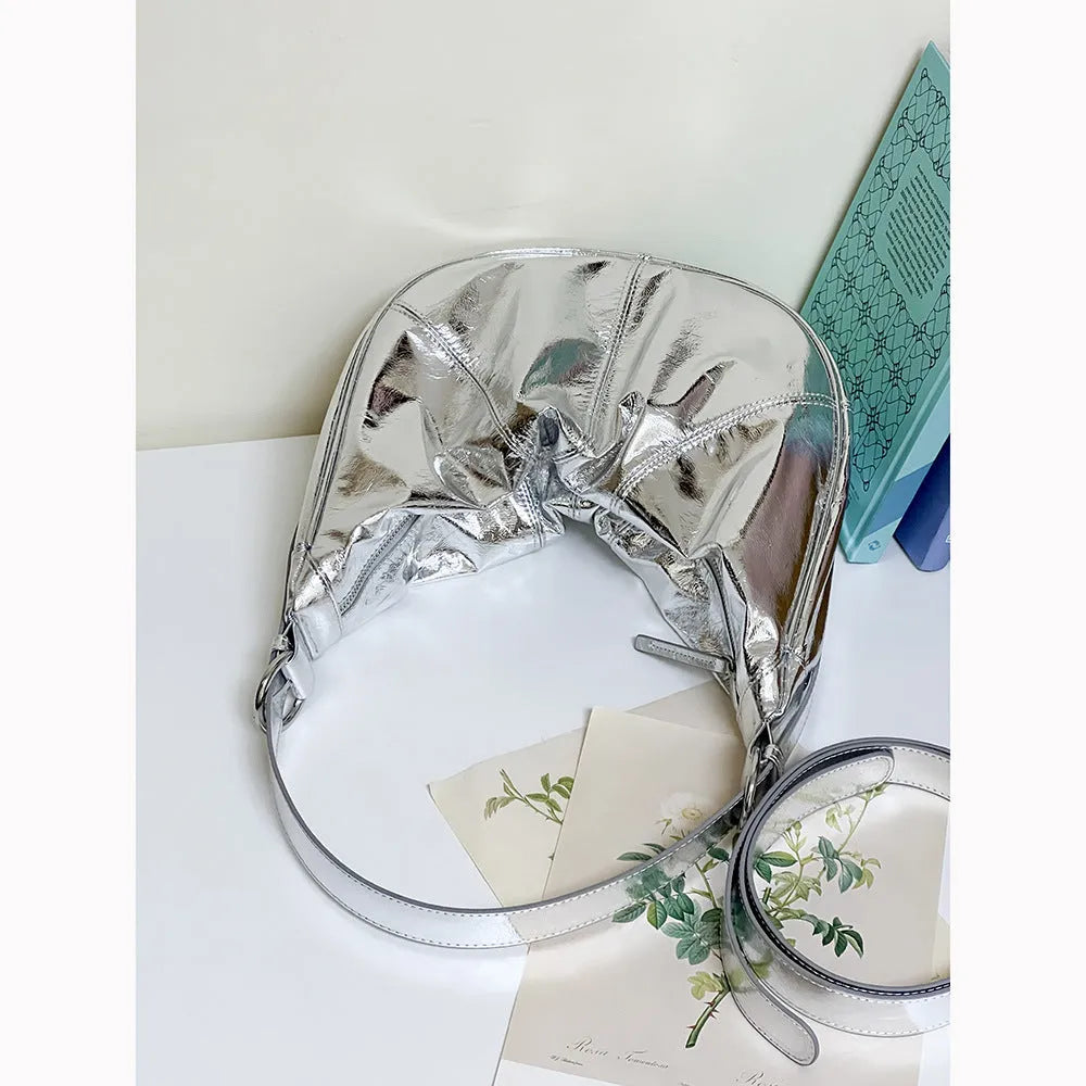 First layer cowhide shoulder bag in dumpling shape with double joint strap and sandwich pocket available in multiple colours
