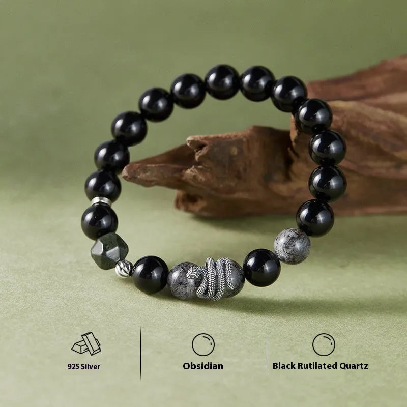 Men's black snake bracelet in sterling silver with obsidian detailing showing 10mm diameter