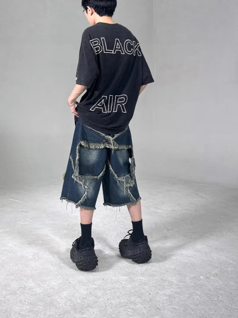 Blue denim shorts with frayed details and five-pointed star design, loose fit summer shorts