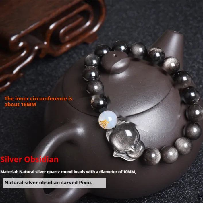 Natural obsidian bracelet with 10mm beads in gold, silver, or black finish.