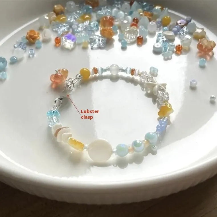 Orange seaside alloy bracelet with diamond charm and round beads for women's summer wear