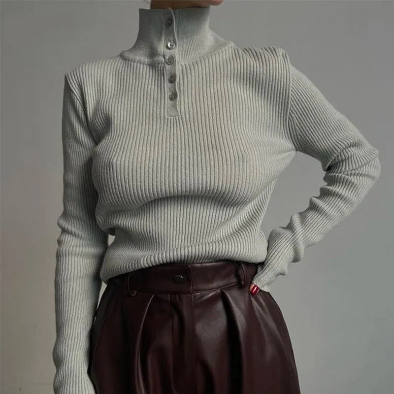 Women's silver grey slim fit half turtleneck pullover sweater with a single-breasted placket.