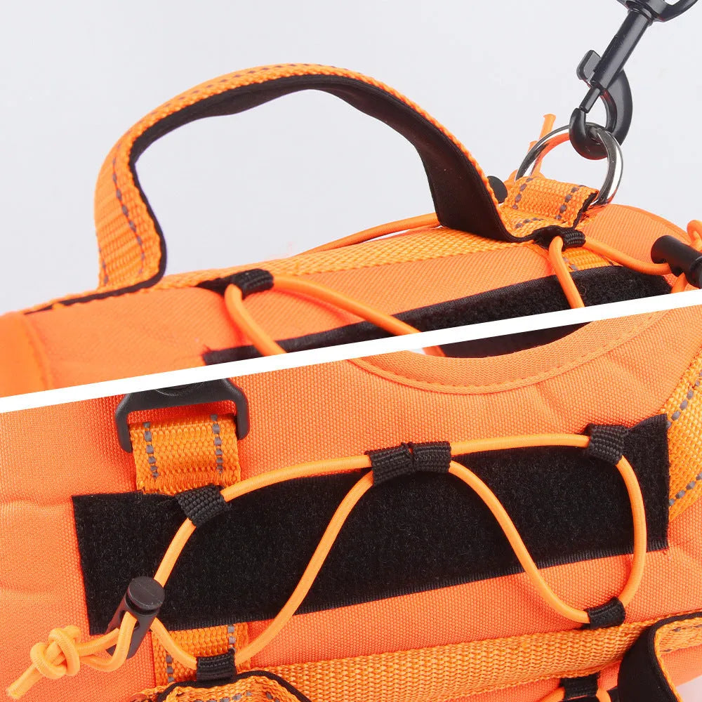 Orange reflective dog vest harness with an attached black hand-holding rope lead on a medium-sized dog.