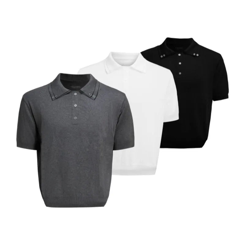 Man wearing a black loose-fit short sleeve shirt with a double lapel collar
