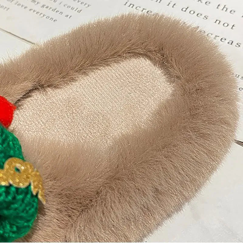 Women's Christmas hat decoration slippers in faux plush with rubber sole.